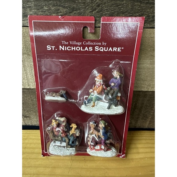 St Nicholas Square Village Collection ice skating figures Set Of 4 Dog Sledding - Picture 1 of 3